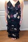 I'm wearing this dress to Mardi Gras and I was super impressed at how nice the fabric was and how well it fit. I didn't want anything super expensive because there is a lot of partying and I didn't want it to get ruined. It's also super fun and I know I will stand out! - Margaret C.