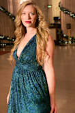 I bought this dress for the nutcracker ballet and it was so pretty. I got many compliments on it. In the picture it's more green but when you get it there is a lot of blue too. Which is still very pretty. - Stephanie J.