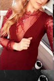 In love with this dress! I had to wear about a 1 inch heel but a two inch heel would have been more ideal for the length of the dress. Everyone loved it and I especially loved the long sleeves with the low v in front. - Janie O.