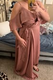 I ordered this dress because of the amazing rose color. I was also intrigued with the shoulder and bust pleats. I ordered an XL because I looked at the sizing charts and customer reviews, and figured that would fit me best, based on my height, weight, and bra size. But overall, it was still loose on me, and the pleats ended up not looking too great. - Victoria B.