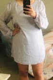 I'm between a 14-16 in pants and this dress in 1X fit me loose. The length was okay. Overall it was a good buy! - Andrea G.