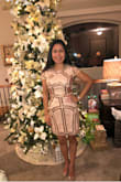 I wore this dress during the Christmas get together with my friends and I love it. It fits like a glove and the length is just right. I received many compliments. This dress is worth buying. - Theresa B.