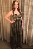 I originally ordered this in a large (my normal dress size) and it was way too big. So, I ordered it in a medium and it fit better but was actually a bit snug around the ribs and my chest didn't fit how it probably should have but it worked out much better than the large and I got compliments all night! - Jessica W.