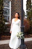I received lots of compliments for this dress! Fits perfectly, had to shorten the length but that was about it. Love everything about the dress! The material, the lace details and the price! No regrets for choosing this as my wedding dress. Thank you Lulus! - Roann A.