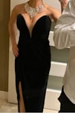 This dress was very comfortable and needed no alterations.  I did tack down the last pleat to give it a flattering look from the side but it wasn't necessary. I would recommend tape for the silicon stripping only holds so well when you're dancing the night away. Very satisfied with my purchase! - Desiree' G.