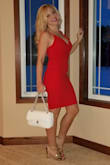 Love this dress! It fits true to size and the color is a vibrant red.  Perfect for date night! - Alisha