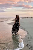 Wore this for an anniversary photo shoot on the beach and it was beyond perfect. Had slits in the bottom of the flowy skirt that makes the dress move beautifully when you walk - Lindsey B.