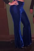 The color is truly royal! The velvet is soft. I wish the material was a bit thicker. - Indiria H.