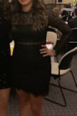 This dress was gorgeous on. I was concerned about the panels inside the dress and how they would shift, but they didn't move throughout the night! It definitely rides up a tiny bit as you walk around, but nothing too drastic. It is both classy and sexy and will get you a ton of compliments. - Ellie K.