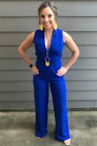 I love this jumpsuit! I am short, so I knew that I would have to alter it. I got it hemmed a couple of inches, and also got the waist smaller. It was a little big in the back, and I wanted it more fitted to me, rather than loose. Overall, it is my favorite outfit yet! - Staci D.