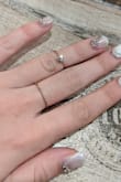 I love how sparkly and cute they are. They add a nice touch to an outfit even if it's not very fancy. They have just the right amount of detail to make them pretty and delicate, but not too boring. Most of the rings have different sizes, so it gives a bit of variety on which fingers you want to have rings on. While a lot of these fit me pretty well, if your fingers are a bit bigger or smaller, your options for which fingers you can put them on will probably be less, so that's the downside to the one size only.
Edit: It's such a shame because I love these rings so much, but I've noticed that over time the gold has started to rub off and reveal a coppery color and silver color on the rings I wear frequently. For the price, it's still a great deal, but I wish they stayed gold - Aya K.