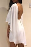 The dress fits well, but the flowy top bit of it is see through. The dress itself is cut almost like a tank top and unfortunately you can see the straps through the top part. I got mine lined with a thicker material because it just looked odd. - Eleanor H.