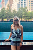 Love this romper! The fabric doesn't stretch at all. I ordered a size up from what I usually get, and it fit great! - Alex H.