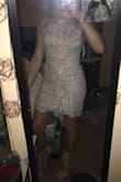 I love how this dress is a halter top, but doesn't let any arm fat poke through that a lot of other halter dresses I have had/tried on do. Fits comfortably and is stretchy! Love it! - Carley S.