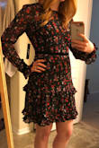 I'd been eyeing this dress for months, waiting for it to come back in my size. Finally snagged it and so happy! The fitted waistline makes it very flattering (it has no stretch.) A little on the short side, but not bad. That's a pretty normal issue for me due to my long torso. The modest neckline and long sleeves are a good balance to the length. I'd say it fits true to size but the shoulder area is a little tight. It's pretty much impossible to lift my arms straight over my head, but it's not a big problem. The sleeves are a tad long too, but not terrible. Overall, I'm very happy with the purchase. Looking forward to having a chance to wear it. - Jenna F.