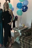 This dress is perfect for so many occasions! Its stretchy so theres wiggle room. I would normally order a large but this is a medium.  Fits well because its stretchy. Love the pockets! Very flattering! - Kate M.