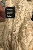 Runs small. Quality isn't great. Too bad it's a final sale or I'd definitely return. Threads are already coming undone and the zipper quality is poor. - Penelope G.