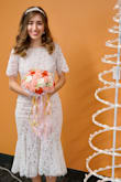 I wore this dress for my civil wedding and got SO many compliments! I am relatively pear-shaped and it fits very well at my chest and hips, creating a mermaid silhouette. It was also very comfortable and not itchy at all. - Meryem O.