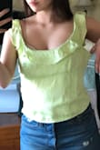I'm very unhappy with this purchase, generally I'm a size small and so that's what I purchased. Not to mention it was final sale. It is HUGE. The straps fall off my shoulders, it's so baggy that my bra shows where the collar lies on my chest, all in all just a very bad purchase, sad because this top would be super cute with a pair of blue jeans. I would really just like to try an xs because this small is more medium.. - Delanie B.