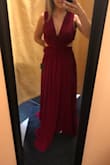 Ordered this dress for a Valentine's Day ball. It fits like a glove, I'm in love with it. I live in Canada and ordered standard shipping it came within 2 weeks. Only problem is I'm short and the dress is too long for me (even with heels) so I'm getting it hemmed. - Erica G.