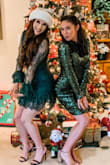 I LOVED this dress and got so many compliments! I actually where it to my bridal shower I was over white and wanted to stand out! It was a Christmas themed bridal shower so I wanted something festive and this delivered! The sleeves are SO beautiful, like a vintage lace the boddess is really
Flattering, I will it does NOT stretch and for me (I wear a small B cup) I had to wear fashion tape so the top wouldn't flap out to show my chest but other than that it was great! The fashion tape was perfect - Alayna B.