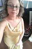 Because I'm short this dress was perfect in length I didn't need to get it hemmed. The material is thick and the straps are adjustable. - Maricela P.