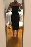 L o v e the material / style of this dress. Tight and flattering body con, sexy but still classy! Definitely would not be wearing this to a wedding with how tight it is throughout, though (attempted to dance and it felt like the material was bouncing my legs back together each time. No real mobility throughout the leg part of the dress). When you take the dress out of the bag, it's shaped like a pear. Because of this odd construction of the dress, when you put the dress on, there's unnecessary bunching of fabric on the hips. Also - to all the short girls out there, the dress is definitely meant for taller girls. I had it bunched up a bit in my pic, but even if I chose to keep it, I'd definitely have to have it tailored. Not the dress for me, so I returned. - Rebecca R.