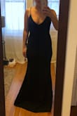 I honestly did not thing I was going to like this dress, but holy canoli. It fits like a glove. It's stretchy so it fit over my size 6 (Medium) hips easily. And with heels around 3 inches, it was the perfect length. I will say the adjustable spaghetti straps aren't the fanciest, however, because there they are adjustable, I can the dress to a tailor eventually and get them permanently sewn. - Angela D.