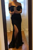 Such a glamorous dress. I felt like an old Hollywood star. It does run long: with 3 inch heels on I still would have needed to hem 1-2 inches. I also found that due to the stretch / tight fit, the leg split kept pulling open: I wanted more of a peak-a-boo slit. Returning simply because I don't have enough fancy events to wear it to. - Angela D.