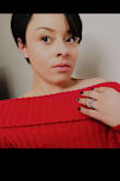I bought this top for Christmas so I could wear it to my family Christmas party. I wore this top with a pair of jeans and black strap open toe heels. It sat perfectly off the shoulders and was the perfect color red!!!! I absolutely loved it! - Angelica M.