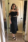 I like how it's a little flirty with the slits and crop top. It's also modest in my opinion, doesn't show too much stomach and the skirt is high waisted. The skirt is also pretty long for someone who is short, it looks better with some wedges/heels. Oh and it has pockets! Haha - Audrey H.