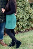 Fit true to size and was super soft and comfortable to wear around the waist. The zipper stayed up. The color was a really pretty green. It was perfect for Christmas. - Julie