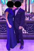 Thick good quality material.  Beautiful color and design.  The dress was long and required to be shortened. - Puja P.