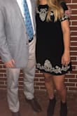 I usually wear a small but ordered a medium and it fit nicely! Wore it to a frat formal and everyone thought it was cute! Material wrinkles easily though - Tayler H.