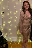 I wore this dress to a roaring 20's gala and I got compliments all night! It fit very nicely, and the sleeves did have a bit of extra room as shown in the model picture so I didn't feel constricted. Though there are lots of sequins, the dress is very comfortable. I was able to wear a normal bra under the dress without it showing through. - Victoria B.