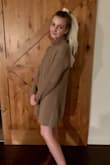 This sweater is such great quality! It's practical and keeps you warm and is so cute. I read in some other reviews that this does not fit like the photo, but for me it did. It's not too over sized, it's just right. - Marbella B.