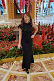 I wore this dress to a Black Tie event and got lots of compliments. The material is nice and thick and most importantly, flattering. I did have to hem the length as it was quite long. The bottom part fit fine, but the top was a little big on me. I had room which showed in the back because it bulged out a bit. Probably because I'm small chested and I normally wear a small and I ordered a medium. Overall great dress! - Karla K.