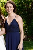 Love this dress - wore it as maid of honor. Had to get it hemmed (as always) because I'm 5'2", but other than that fits perfectly. Needs a sticky bra or some sort of special bra for sure, due to the low cut nature and also the back. - Shayna S.