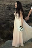 The dress fits great !! It is everything I looked for for my engagement pictures+ got to me super fast, highly recommended - Tal S.