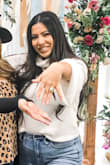This sweater is so cute but just a little see through. I would recommend a cami underneath. - Chan M.