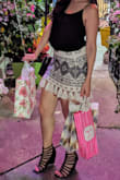 Such a pretty unique skirt, love the tassles and design. Only thing was a little tight compare to the other skirts I have ordered in the same size. - Tara D.
