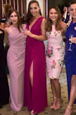 Love this dress and the slit is super flattering and sexy. I had to get the top part hemmed because it was a little too big but I also have a smaller bust so that could have been why. - Tara D.