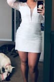 A little short, but I do have a big booty and thick tights. It hugs all the right curves. It feels really good quality very comfortable. And the embroidery shines a little when light hits it. Super adorable and sexy - Andrea P.