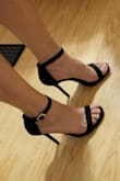 These shoes are beautiful! It gives your feet and legs a sexy, feminine look. Very simple and yet looks very pretty. I will be wearing these shoes for a wedding as a bridesmaid and I cannot wait! - Lovey W.