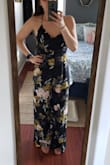 It's a bit of a challenge to get into/out of because of the straps, but worth it for the look! I was worried I'd have to get the length altered but with some short chunky heels it was perfect. The straps tighten and hold the girls up perfectly without a traditional bra (will probably use stick ons). Love that it looks like a dress if you're just standing but once you move it flows and is just so fun! - Christine M.