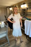 Wore this dress for my rehearsal dinner and loved it! Fitted yet very classy! I liked how it still had a bridal feel with all the beautiful lace but was different than typical dresses with it being midi and flared - Stephanie D.