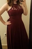 Love it! Ordered both a small and a medium, went with the small. I'm usually a size 6 but I have a big chest. This fits well, supports the ladies, and then drapes beautifully to show the best parts of my curves. Will have to get the length tailored a little before my friend's wedding, but the bride is very specific about how she wants the length of the bridesmaid dresses so its for the best! All in all good find! - Cosette G.