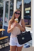 Very versatile top. My favorite look is tied in the front with high waisted white shorts! Soft and breathable material! - Caylee C.