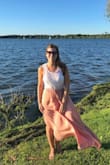 I can wear this skirt every single day!! It's so light and flowy, I absolutely love it. The color is very flattering. The fit is perfect besides only being 5'2 the skirt is much longer on me. - Caylee C.