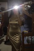 The dress is gorgeous!! I love how the material is stretchy and overall very flattering. It is very bodycon, which I like so i would recommend either sizing your size or up if necessary. I will 100% be wearing this for my birthday!! - Rachel L.